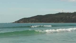 Surfing Byron Bay under the lighthouse.