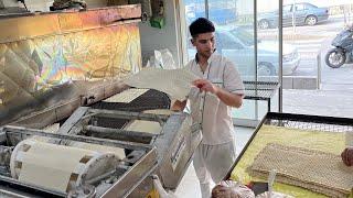 How Lavash Bread Is Made In Iran | The brave boy bakes Yufka lavash bread in Iran 