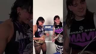 rhea ripley receives a gift from dominik