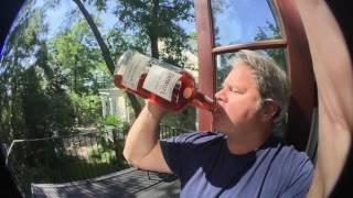 Dude chugs jug of Scotch whiskey in seconds !