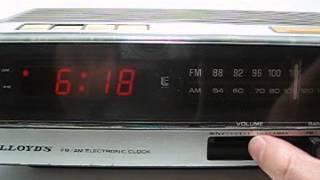 Vintage Lloyd's Electronic Alarm Clock Radio Faux Wood Finish Retro Model J260