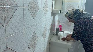 Tahereh, a rural woman, cooks and cleans her home. Then She performs ablution and prays