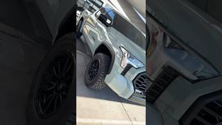 AMP Research Power Steps & Bed Step On Lifted Toyota Tundra Lunar Rock