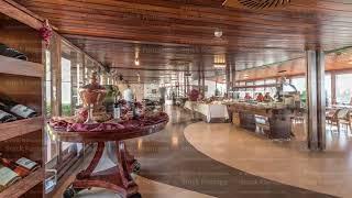 Panorama showing morning catering buffet food indoor in luxury restaurant with meat, colorful fruits