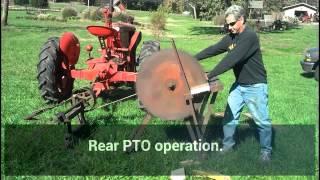 1953 VAC CASE tractor running a buzz saw.