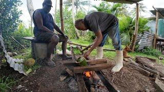 Cooking Eel In A Bamboo In An Open Fire