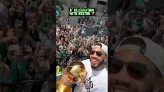 Jayson Tatum still with the Larry O'Brien trophy at the Celtics championship parade ️