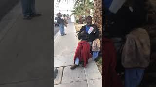 George Gstar Charity Passing Out Money To Homeless Men and Friends at Gas Station : Las Vegas, NV