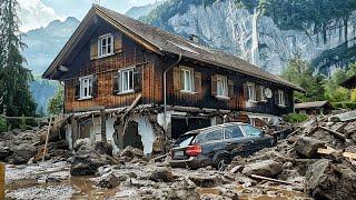 SCHWEIZ - EIN DURCH ÜBERSCHWEMMUNGEN ZERSTÖRTES DORF - TÖDLICHE KATASTROPHE IN DER SCHWEIZ