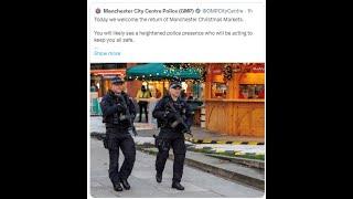 When did Christmas Markets in England need to be guarded by heavily armed police officers?