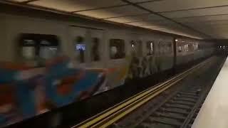 Athens Metro: A Graffitied 2nd Generation Train Passes Through Attiki Station