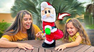 DEI UM PAPAI NOEL QUE DANÇA E MEXE O BUM BUM  PRA MINHA IRMÃZINHA !