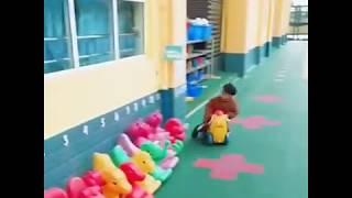 Little kid parks scooter like a boss