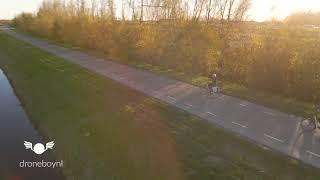 Beautiful autumn day- cheerful cyclists - droneboynl - 4K