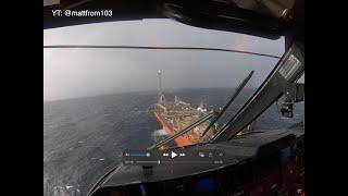 CH-149 Cormorant helicopter landing on floating oil platform