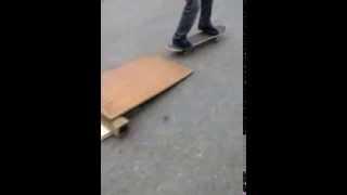 Anthony Velazquez kickflips up a ramp first try