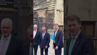 Nigel Farage and his fellow Reform UK MPs arrive at the House of Commons