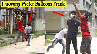 Throwing ice Water Balloons at People  Prank || By - ComicaL TV