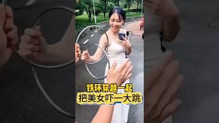 Iron Ring Penetration Magic Unveiled铁环穿透术把小姐姐吓一大跳#连环术 #魔术揭秘 #穿越现象