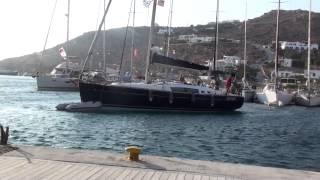 Successful sailboat docking in gusty wind (Mykonos)