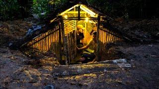 camping in heavy rain accompanied by lightning and thunder, building a warm underground shelter