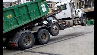 Crazy roll-off truck driver.