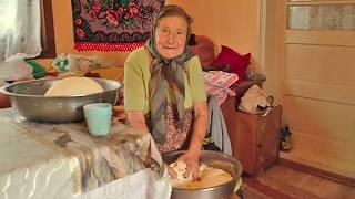 Happy old age of an elderly woman in a mountain village far from civilization