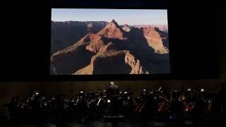 Olympia Symphony Orchestra performs Dvorak's "New World Symphony," with visuals by Adrian Wyard