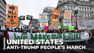 People’s march in DC: Thousands gather in US capital to protest Trump ahead of inauguration day