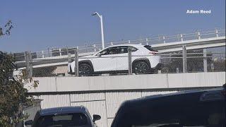 How did a car end up on Dallas' new pedestrian bridge?