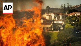 Homes lost as wildfire rages in Southern California