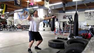 140 One Arm Push Press