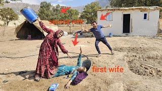 The second wife plans to throw the first wife out of the house by fighting and harassing her