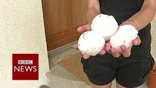 Hail "like golf balls" as storms hit Europe - BBC News