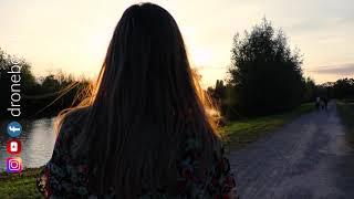 Beautiful golden hour shots of my (cute) girlfriend meeting a (cute) baby cow - droneboynl - 4K