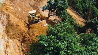 Powerful CAT D6R XL Dozer Leveling The Hill For Plantation Road Construction