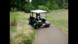 Imbecile Runs Over Himself With His Own Golf Cart.