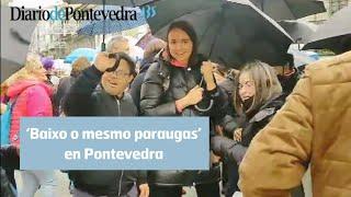 Decenas de personas se reúnen 'Baixo o mesmo paraugas' en Pontevedra