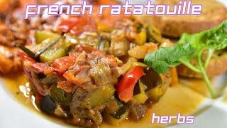 French vegetable stew "Ratatouille" with Mediterranean herbs - colorful and healthy vegetarian dish