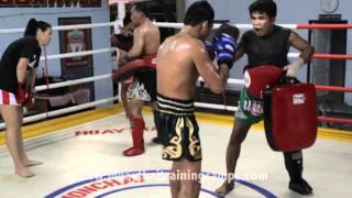 Pornsenah Sitmonchai doing leg kicks