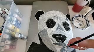 Painted a panda bear on Cardboard