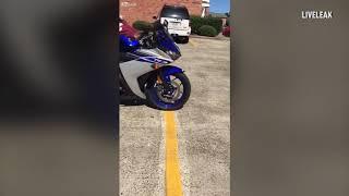 Boyfriend's attempt at teaching partner how to ride his high-powered motorbike