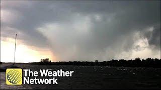 DOWNBURST caught on camera as tornadoes ravage region