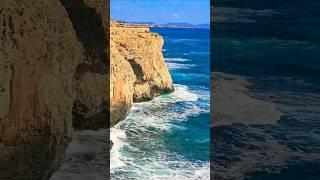 Mediterranean waves meet the rocky shore.  Cales de Mallorca.  