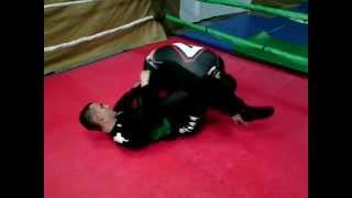 Armbar counter to the toe hold from omoplata