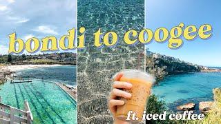 pov you're doing the bondi to coogee walk on a sunny sydney day while drinking an iced coffee