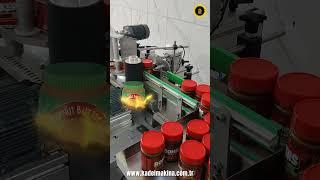 FISTIK EZMESİ ETİKETLEME MAKİNESİ(SİLİNDİRİK YÜZEY ETİKETLEME MAKİNESİ)