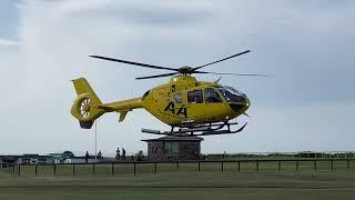 Air ambulance lands at North Berwick Golf Course. G-SPHU