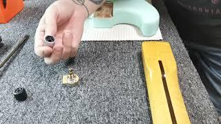 tightening / installing your volume or tone pots knobs on a guitar or device.