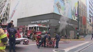 Three firefighters rescued battling fire at Main Street Market downtown